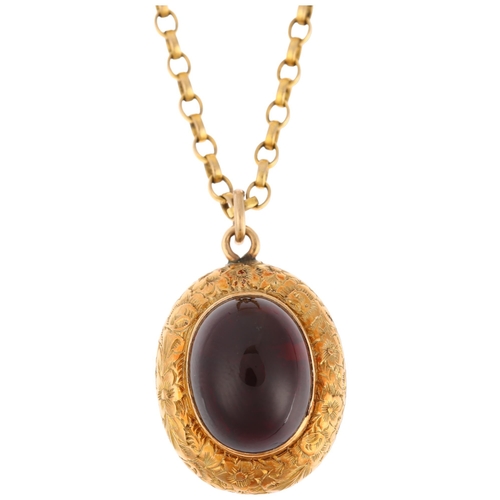 1174 - A Victorian 15ct gold garnet memorial locket pendant necklace, the central foil-back oval cabochon g... 