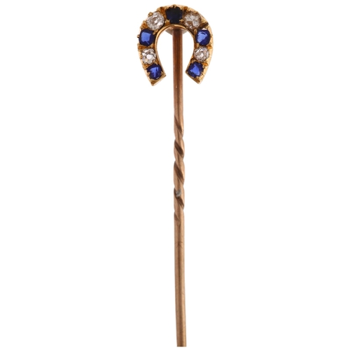 1178 - A Victorian blue paste and diamond horseshoe stickpin, unmarked yellow metal settings, head 9.3mm, o... 