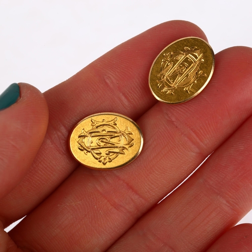 1179 - A pair of Victorian 15ct gold oval cufflinks, engraved with monogram DMC, 16.3mm, 9.6g