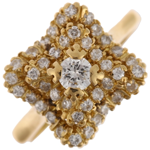 1186 - A late 20th century 18ct gold diamond cluster ring, import London 1980, square stepped wavy form, pa... 