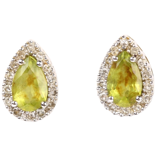 1195 - A pair of 9ct white gold peridot and diamond pear cluster earrings, set with pear-cut peridots and s... 