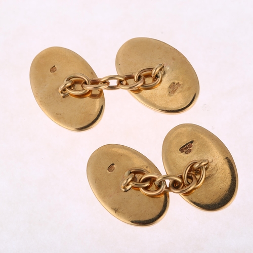 1198 - A pair of 9ct gold oval cufflinks, maker SB, with engine turned decoration, 18.8mm, 14.1g