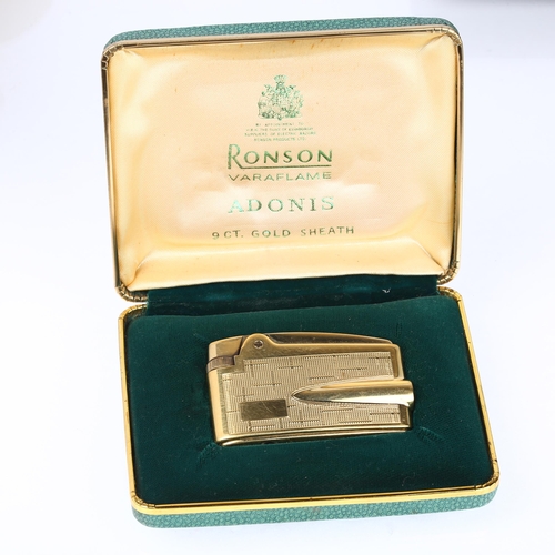 1201 - A Ronson Adonis 9ct gold sheath varaflame pocket cigarette lighter, circa 1970s, length 6cm, in fitt... 