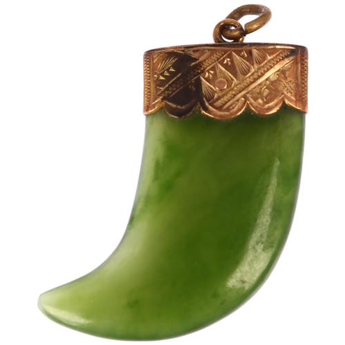 1264 - A Victorian nephrite tiger claw pendant, unmarked yellow metal engraved mount, 34.8mm, 7.2g