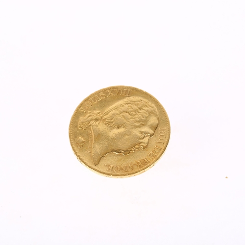 1204 - A French 1820 Louis XVIII gold twenty francs coin, 21mm, 6.3g