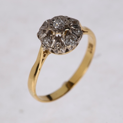 1214 - An 18ct gold diamond flowerhead cluster ring set with old and single-cut diamonds, total diamond con... 