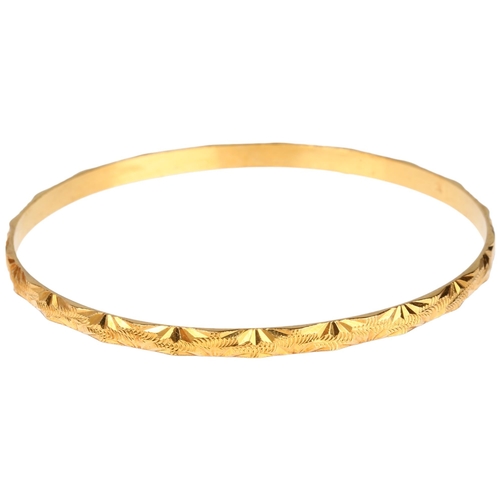 1218 - A Middle Eastern high carat gold slave bangle, band width 4mm, internal circumference 20cm, 15.4g