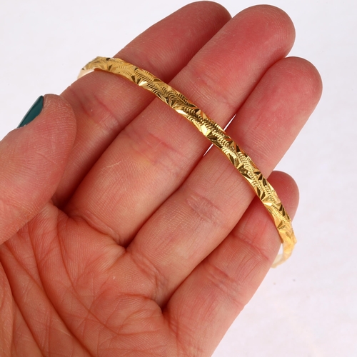 1218 - A Middle Eastern high carat gold slave bangle, band width 4mm, internal circumference 20cm, 15.4g