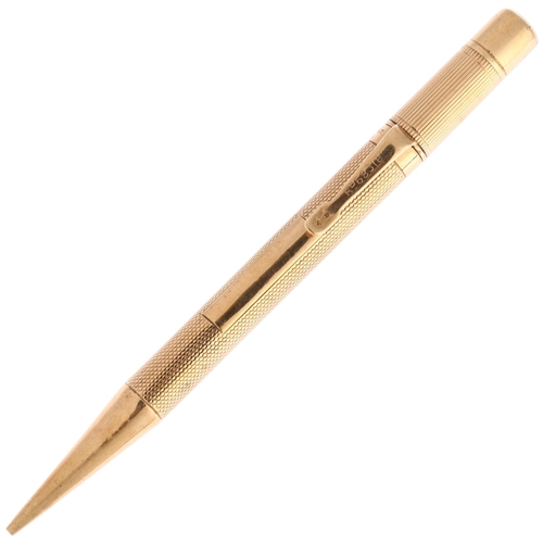 1220 - SAMPSON MORDAN & CO - an Art Deco 9ct gold Everpoint propelling pencil, London 1928, engine turned a... 