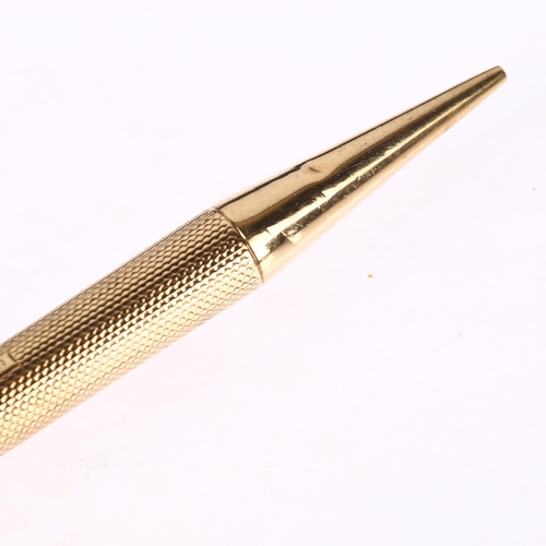 1220 - SAMPSON MORDAN & CO - an Art Deco 9ct gold Everpoint propelling pencil, London 1928, engine turned a... 