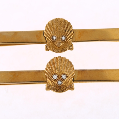 1226 - A pair of 9ct gold diamond Shell 30 and 35 Years Service tie clips, maker AC Co Ltd, Birmingham 1967... 