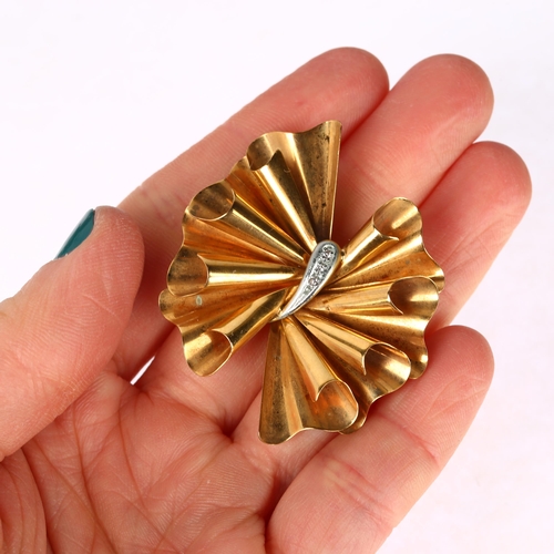 1237 - A 1970s 9ct two-colour gold diamond fold brooch, by Zales, 48.2mm, 6.2g