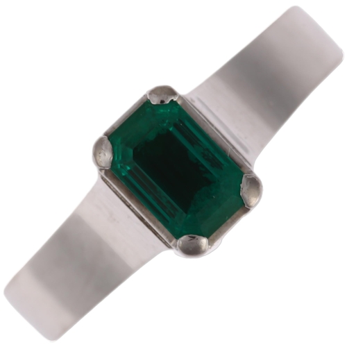 1238 - An 18ct white gold solitaire emerald ring, maker BEV, palladium-topped, claw set with 0.5ct octagona... 