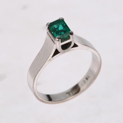 1238 - An 18ct white gold solitaire emerald ring, maker BEV, palladium-topped, claw set with 0.5ct octagona... 