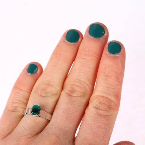 1238 - An 18ct white gold solitaire emerald ring, maker BEV, palladium-topped, claw set with 0.5ct octagona... 