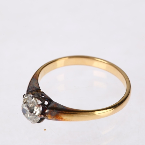 1240 - A 1ct solitaire diamond ring, unmarked gold settings, claw set with old mine-cut diamond, diamond we... 