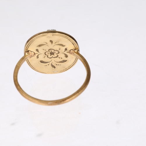 1246 - An Antique sardonyx shield cameo ring, unmarked gold settings with relief carved panel depicting vac... 