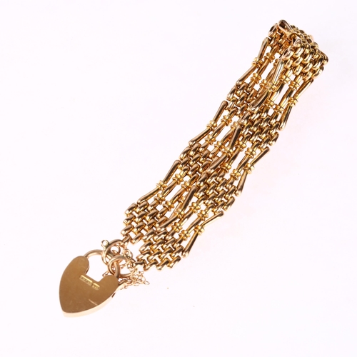 1249 - An early 20th century 9ct gold gatelink bracelet, with 9ct heart padlock clasp, 18cm, 18.1g