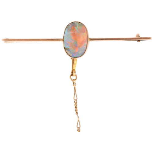 1253 - An early 20th century 9ct rose gold opal bar brooch, rub-over set with oval flat cabochon opal measu... 