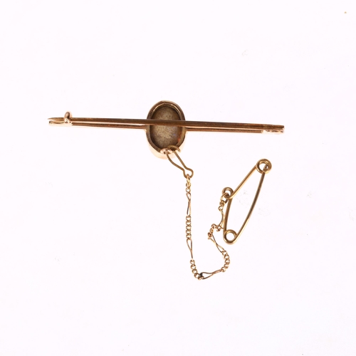 1253 - An early 20th century 9ct rose gold opal bar brooch, rub-over set with oval flat cabochon opal measu... 