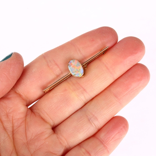 1253 - An early 20th century 9ct rose gold opal bar brooch, rub-over set with oval flat cabochon opal measu... 