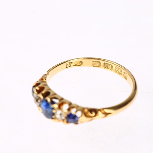 1256 - An early 20th century 18ct gold graduated five stone sapphire and diamond half hoop ring, maker L&L,... 