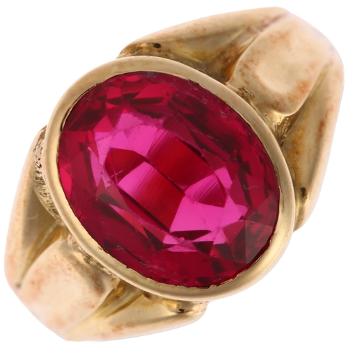 1257 - A synthetic ruby signet ring, unmarked gold settings, rub-over set with oval mixed-cut synthetic rub... 