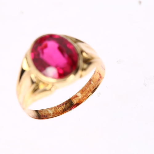 1257 - A synthetic ruby signet ring, unmarked gold settings, rub-over set with oval mixed-cut synthetic rub... 