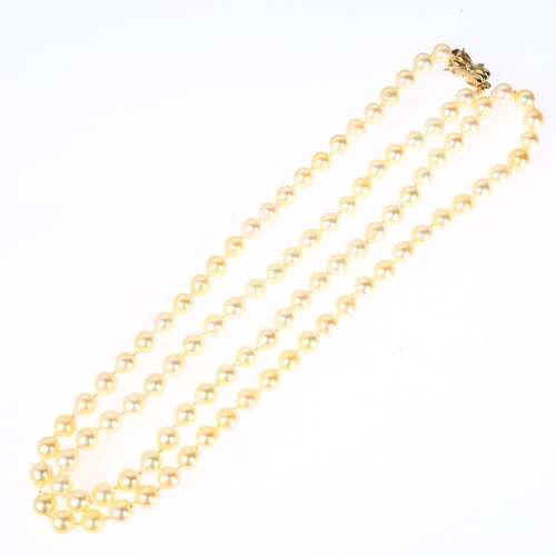 1258 - A single-strand cultured pearl bead necklace, with 9ct gold diamond clasp, 7.7mm pearls, 88cm, 65.5g