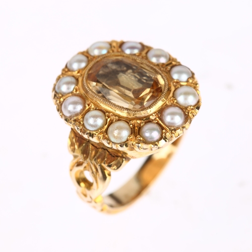 1260 - A Victorian foil-back citrine and split pearl oval cluster ring, rub-over set with oval mixed-cut ci... 