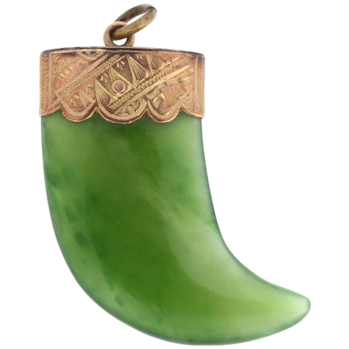 1264 - A Victorian nephrite tiger claw pendant, unmarked yellow metal engraved mount, 34.8mm, 7.2g