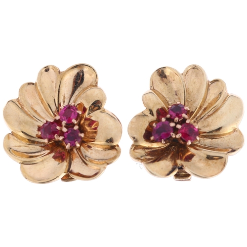 1268 - A pair of 9ct rose gold ruby flowerhead clip-on earrings, circa 1950s, 17.6mm, 6.4g