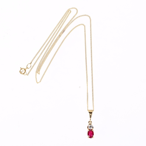 1270 - A ruby and diamond drop pendant necklace, unmarked gold, claw set with 0.5ct oval mixed-cut ruby and... 