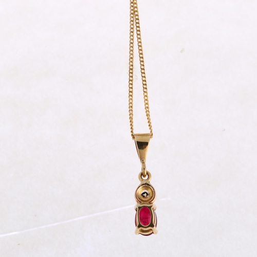 1270 - A ruby and diamond drop pendant necklace, unmarked gold, claw set with 0.5ct oval mixed-cut ruby and... 