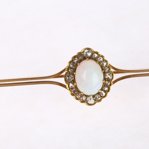 1271 - A Victorian 15ct gold opal and diamond cluster bar brooch, the central oval cluster claw set with ov... 