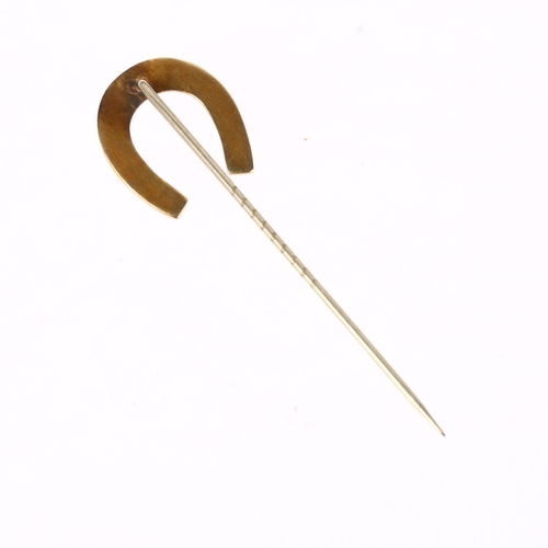 1275 - A Victorian split pearl horseshoe stickpin, unmarked yellow metal settings, head 21.2mm, overall 65.... 