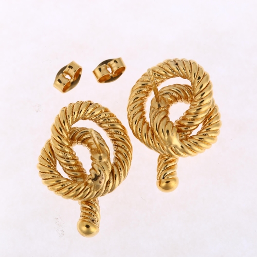 1284 - A pair of 9ct gold rope twist knot earrings, with stud fittings, 25.9mm, 4.8g