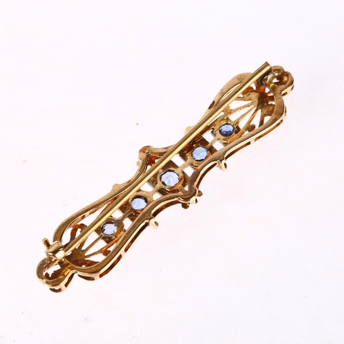 1286 - An Edwardian five stone sapphire openwork brooch, unmarked gold settings, 52.4mm, 5.4g