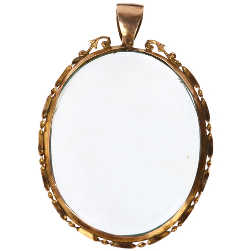 1288 - A large early 20th century 9ct rose gold double-sided photo locket pendant, 60.2mm, 13.8g