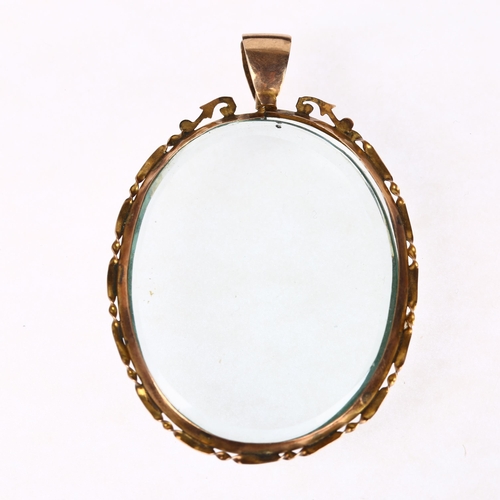 1288 - A large early 20th century 9ct rose gold double-sided photo locket pendant, 60.2mm, 13.8g