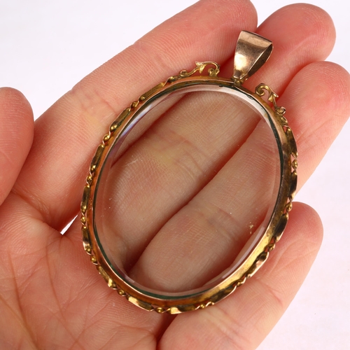 1288 - A large early 20th century 9ct rose gold double-sided photo locket pendant, 60.2mm, 13.8g