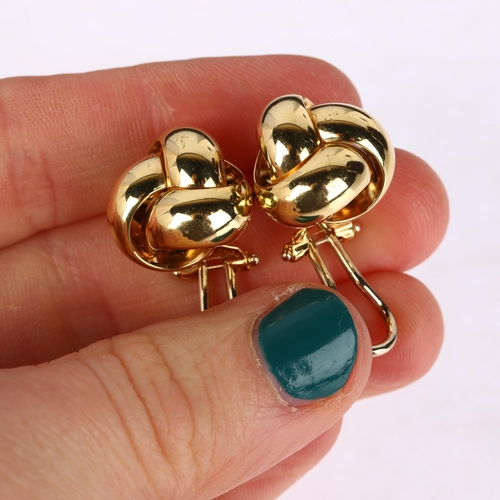 1289 - A pair of late 20th century 18ct gold knot earrings, maker BC Ltd, Sheffield 1998, with clip and pos... 