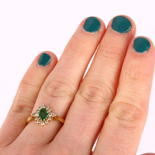 1290 - An 18ct gold emerald and diamond oval cluster ring, maker ST, London 1988, claw set with oval mixed-... 