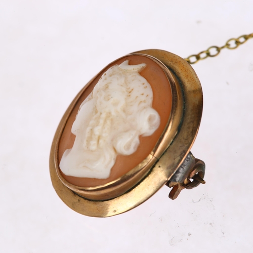 1294 - A 9ct gold shell cameo brooch, relief carved depicting Nyx Goddess of Night, 22.7mm, 3.1g