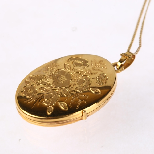 1295 - A 9ct gold photo locket pendant necklace, engraved floral decoration with 9ct fine curb link chain, ... 