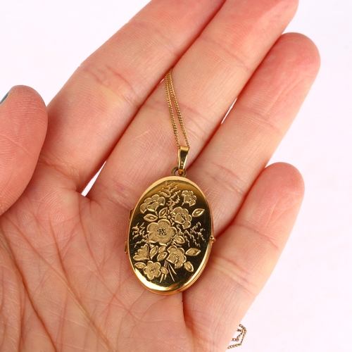 1295 - A 9ct gold photo locket pendant necklace, engraved floral decoration with 9ct fine curb link chain, ... 