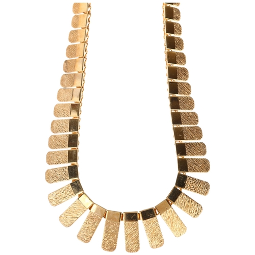 1297 - A 9ct gold graduated fringe necklace, 42cm, 21.7g