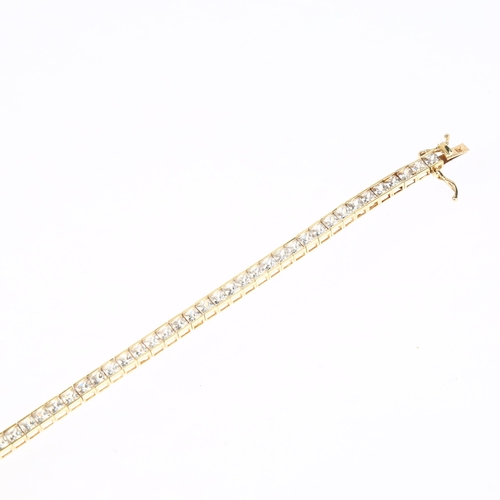 1302 - A 14ct gold cubic zirconia tennis line bracelet, 18cm, 10.2g gross