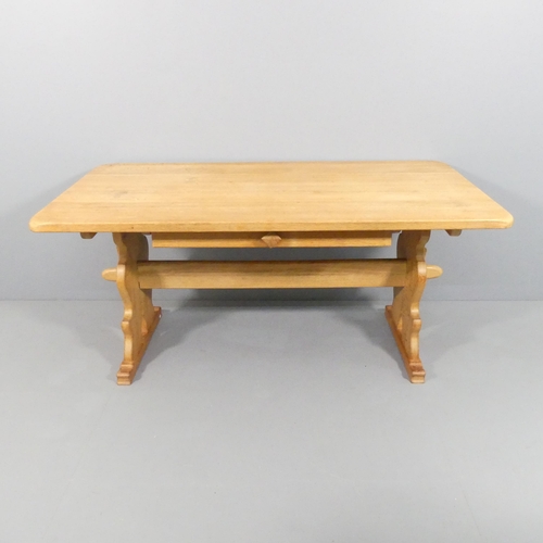 2004 - A mid-century Danish oak trestle dining table with pegged construction and drawer under in the manne... 