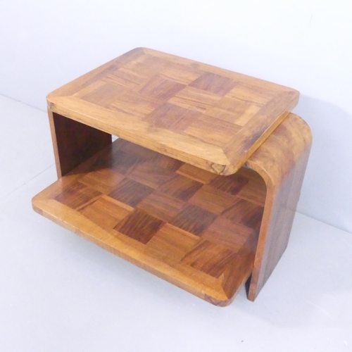 2008 - A 1930s two-tier Art Deco coffee table with geometric parquetry surfaces. 76x54x58.5cm.